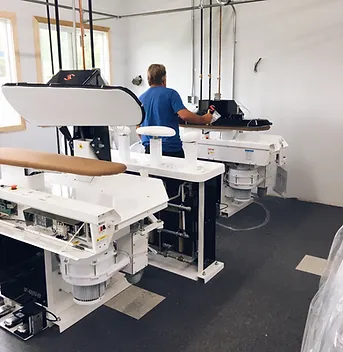 Shirt pressing machines in the Don Royal dry cleaning plant